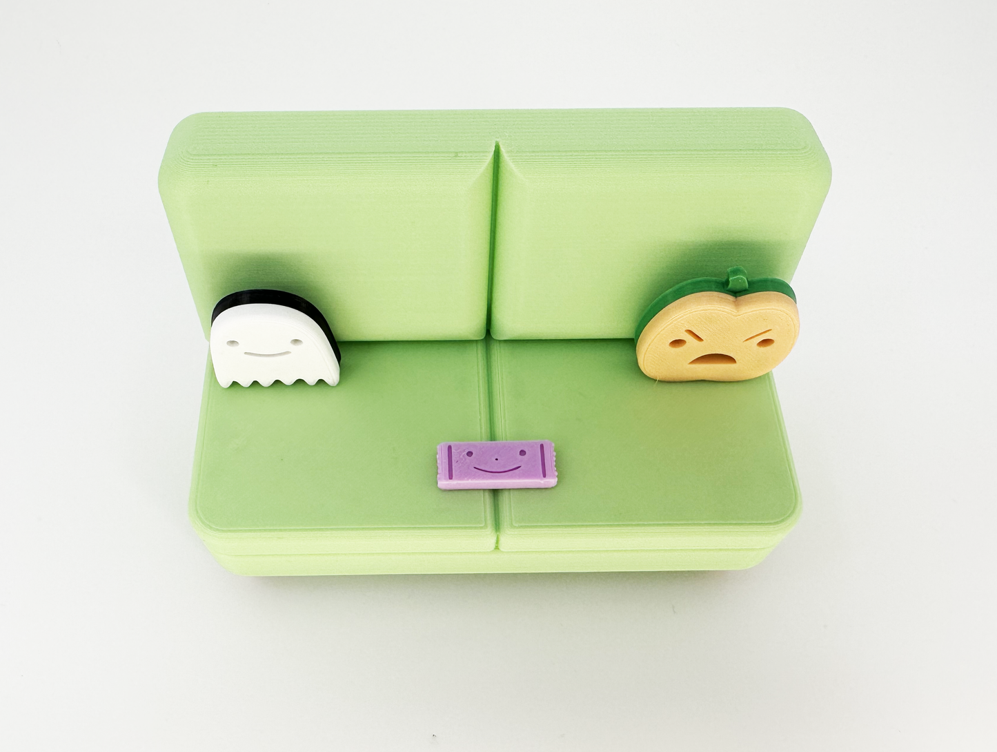 The Halloween Colab Couch Phone Holder with Candy Bar and Ghost + Pumpkin Pillows