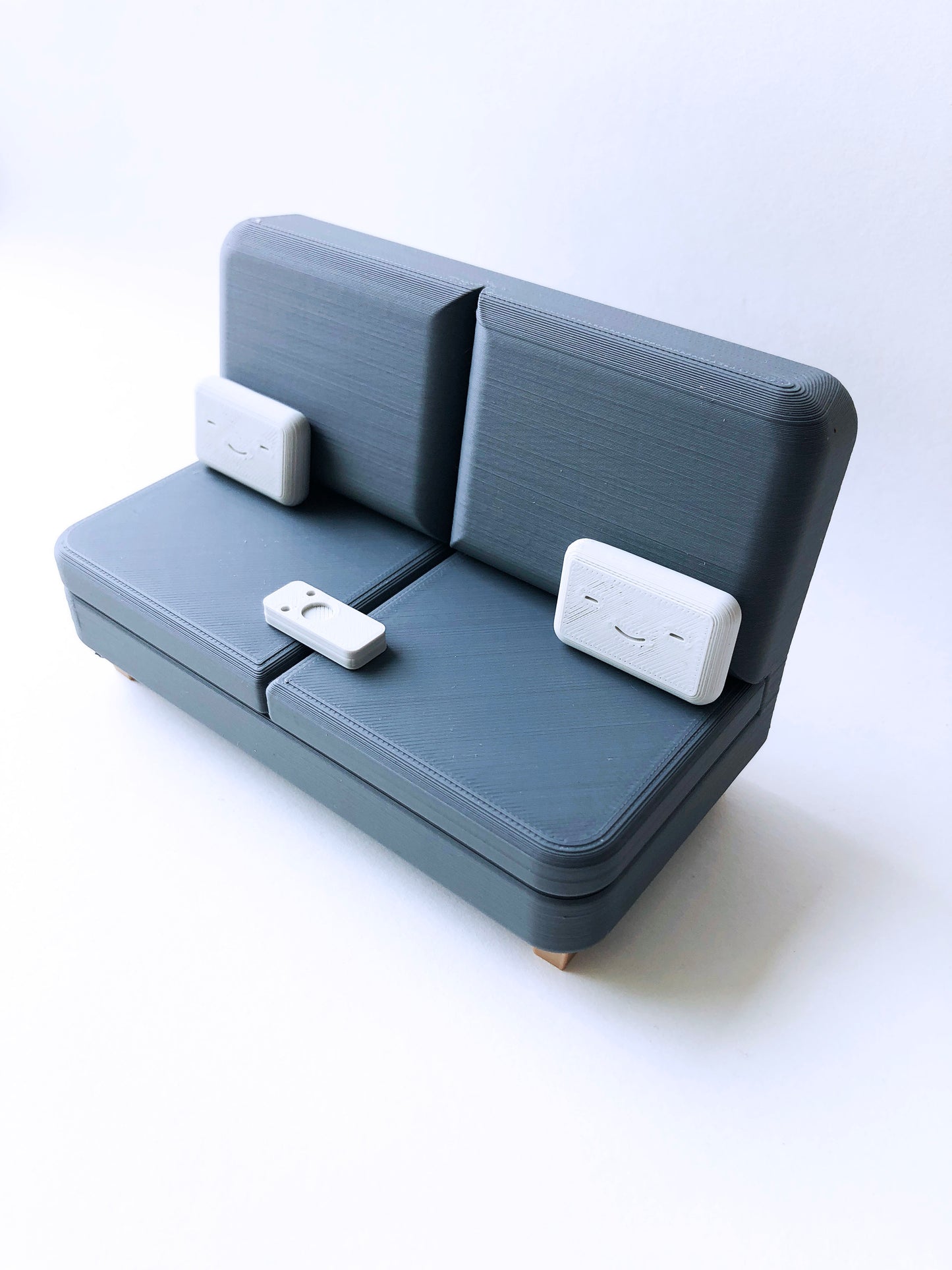 The Colab Couch Phone Holder with Remote and Pillows