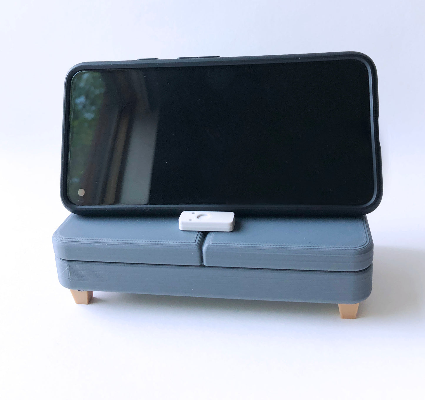 The Colab Couch Phone Holder with Remote and Pillows