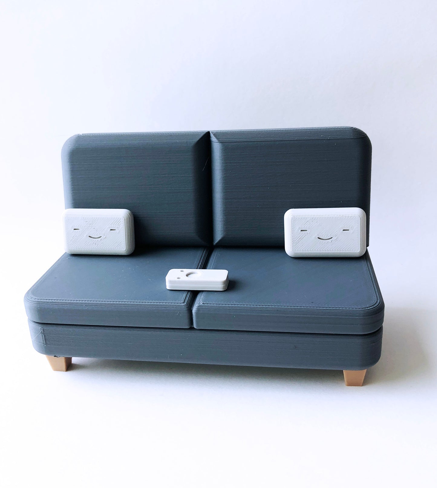 The Colab Couch Phone Holder with Remote and Pillows